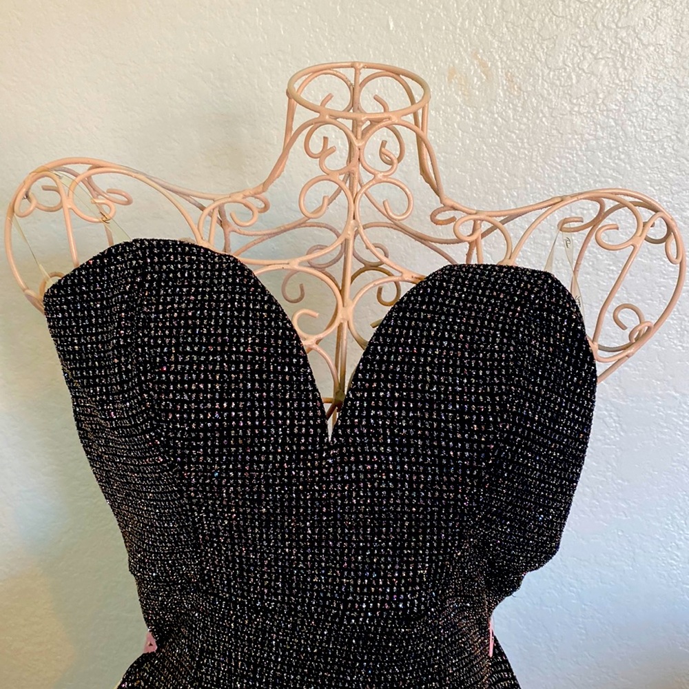 Stunning black mini dress with shinning colorful glitter and perfect silhouette